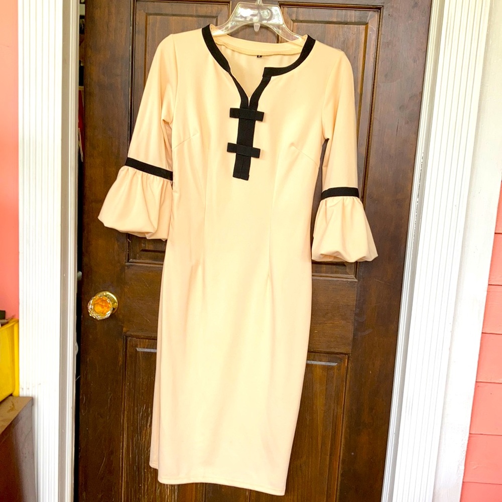 Butter with black trim balloon sleeve midi dress.